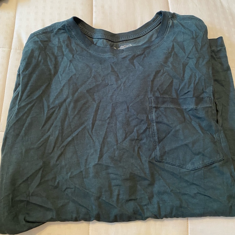 Forest green V neck with frocket. Never worn.